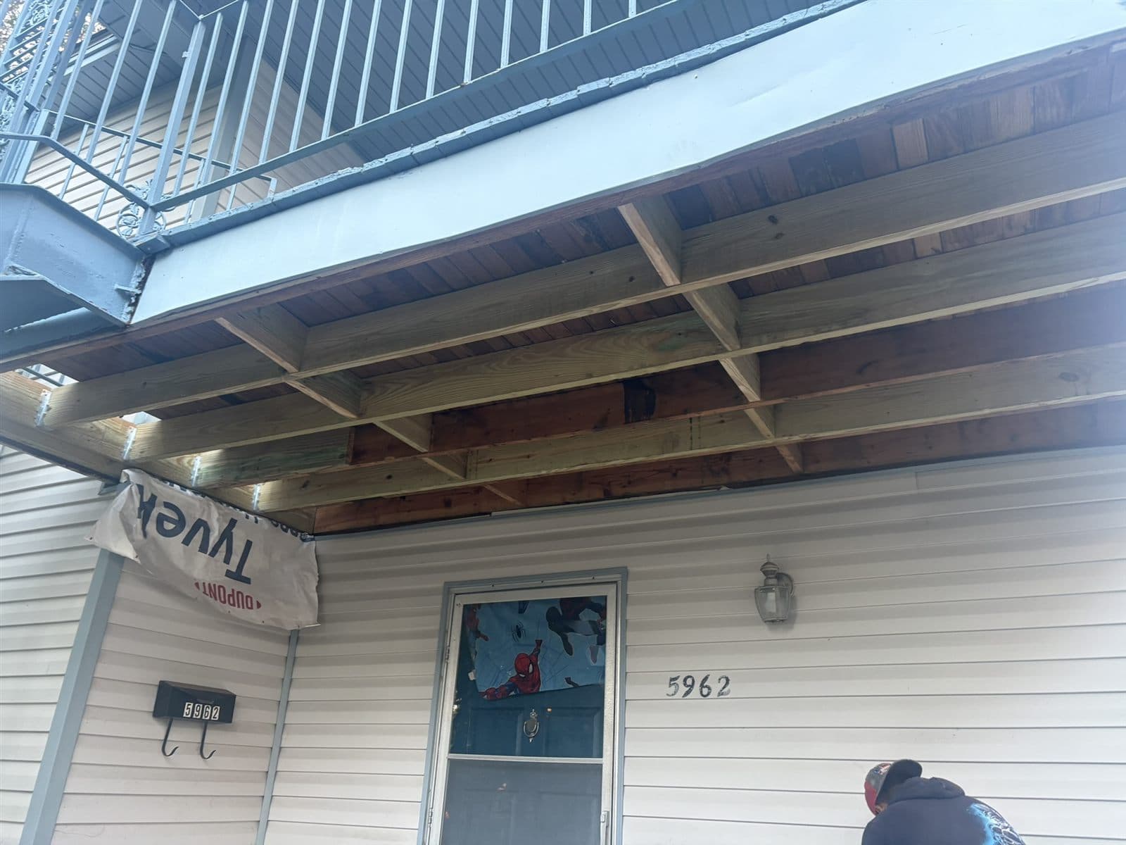 Exterior soffit and overhang repair in progress